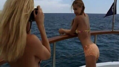 Carmen Electra wearing bikini top as she starts dancing for